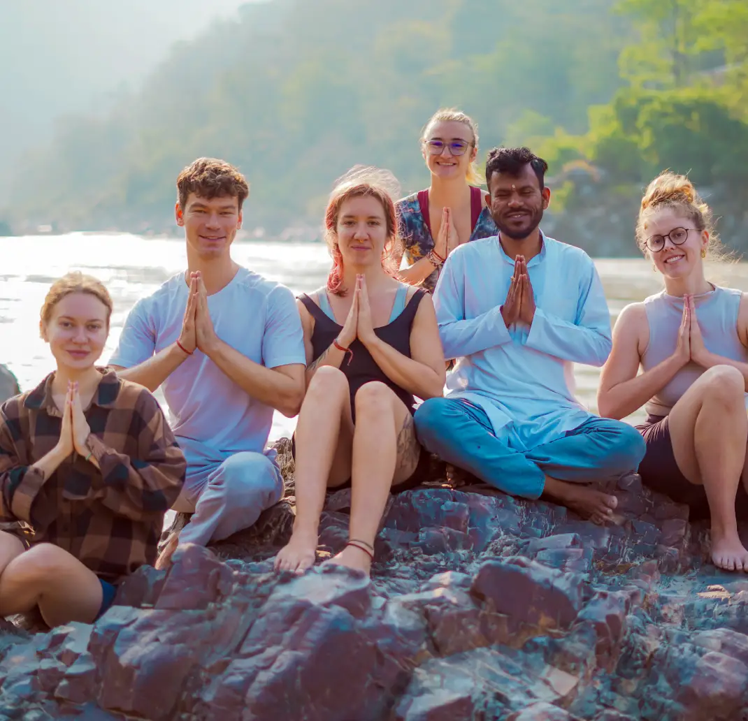 Students practising yoga during teacher training at 8 Limbs Yoga School in Rishikesh