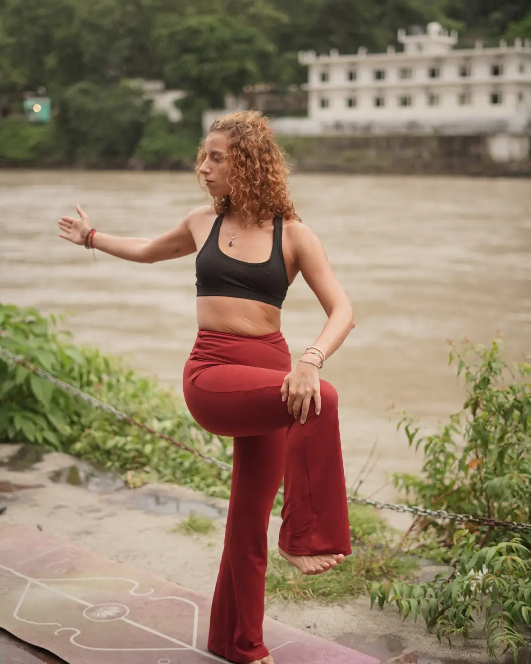 Students taking part in a yoga session at 8 Limbs Yoga School in Upper Tapovan, Rishikesh
